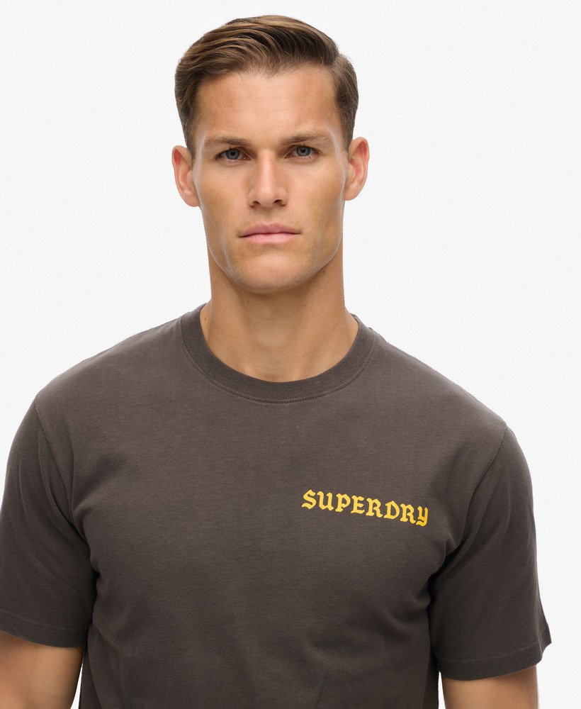 camiseta folgada com estampa de tatuagem na cor preto vintage