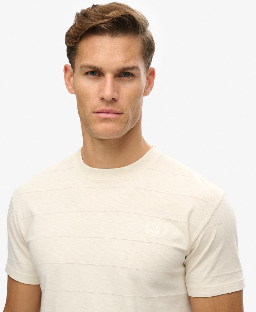 camiseta de algodão orgânico com textura vintage na cor areia branca
