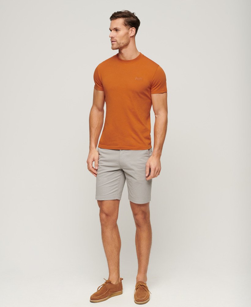 camiseta essential de algodão orgânico com logo bordado na cor laranja mojave