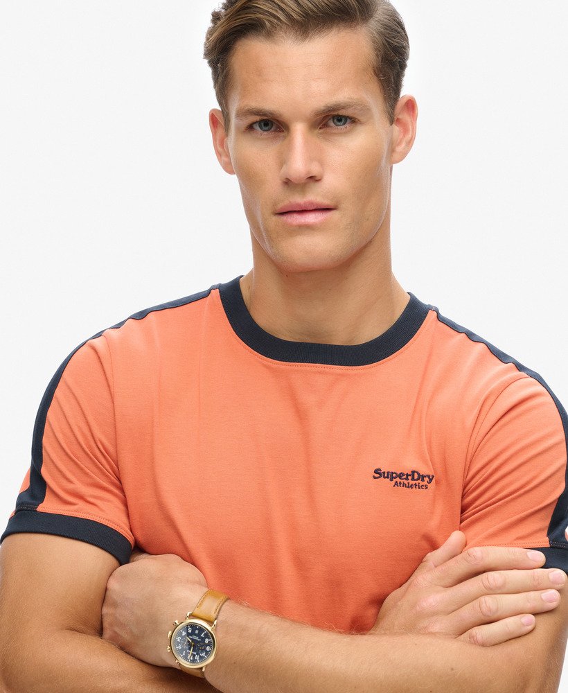 camiseta retrô essential logo em laranja mangaazul marinho eclipse