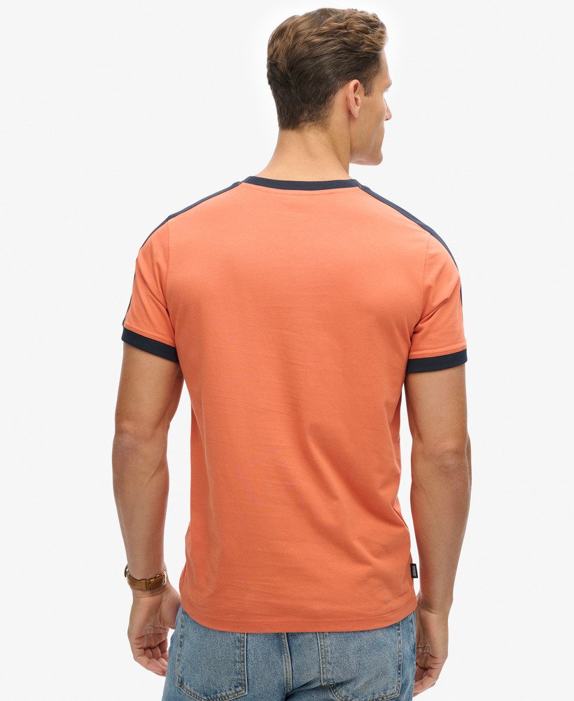 camiseta retrô essential logo em laranja mangaazul marinho eclipse
