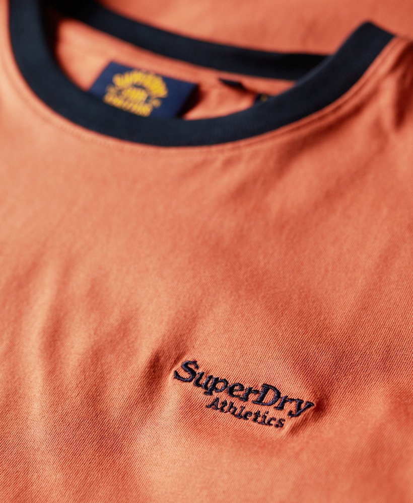 camiseta retrô essential logo em laranja mangaazul marinho eclipse