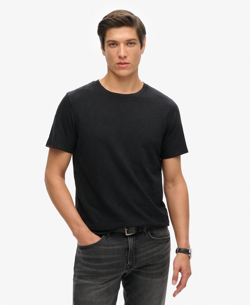 camiseta de manga curta com gola redonda em tecido texturizado preto.