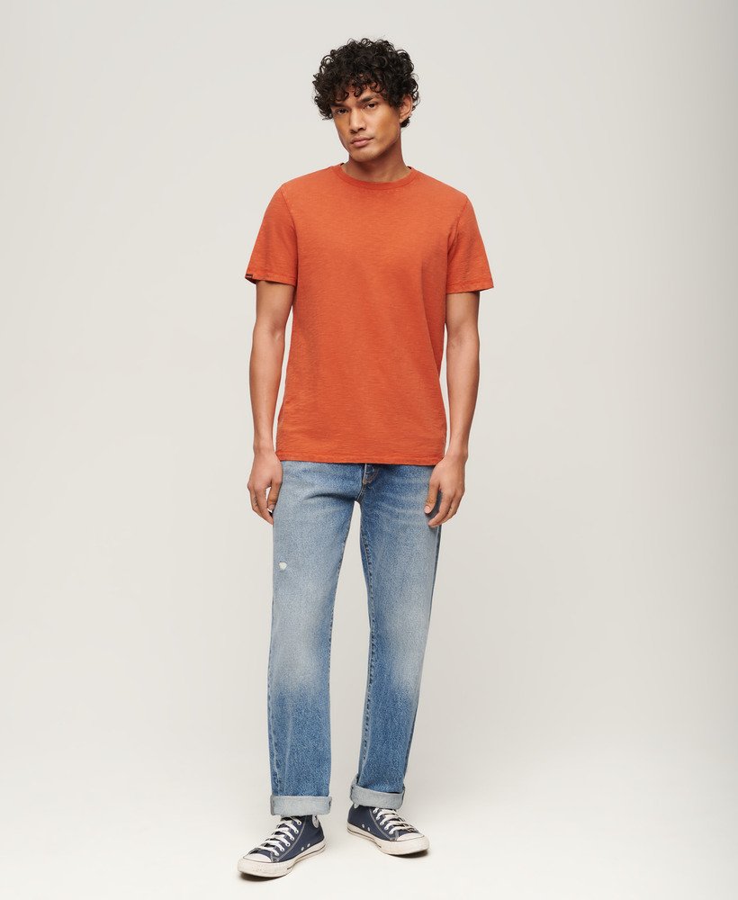 camiseta de manga curta com gola redonda em tecido texturizado na cor laranja mecca.