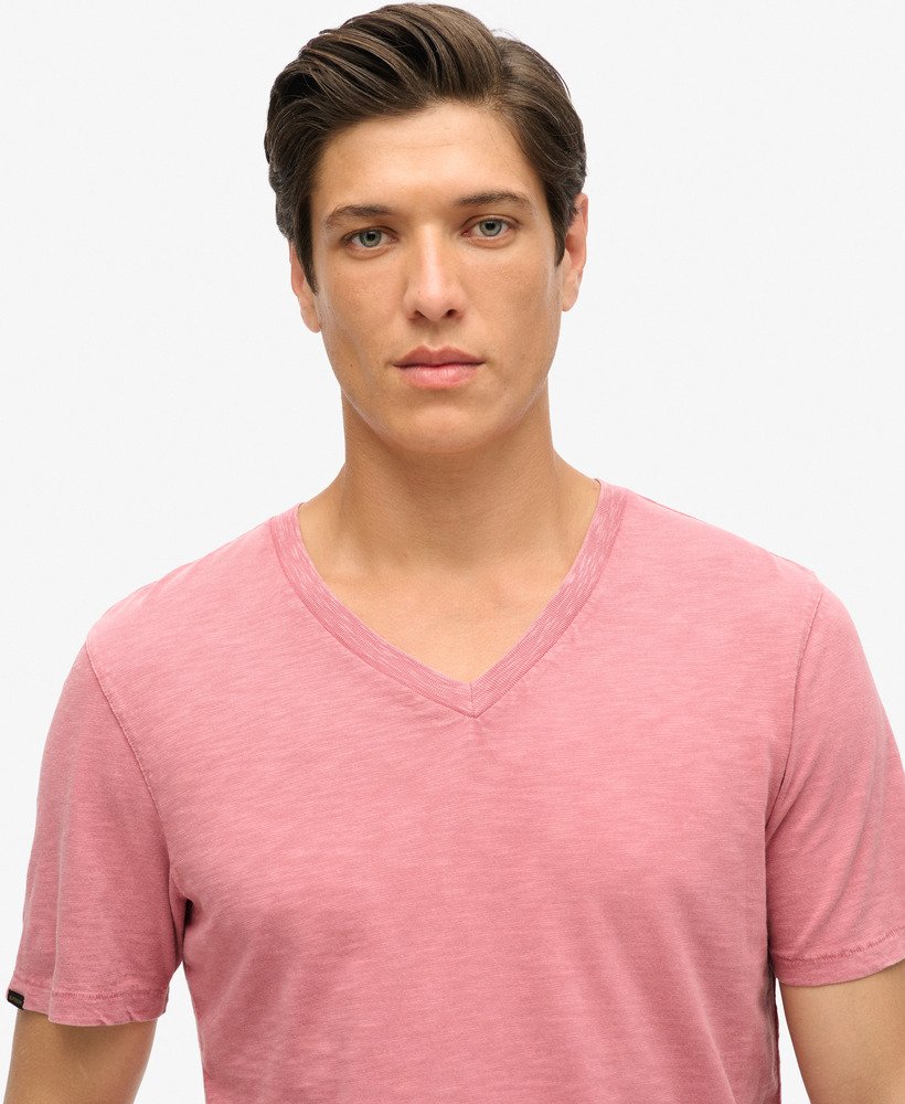 camiseta de manga curta com decote em v em tecido texturizado rosa mesa.