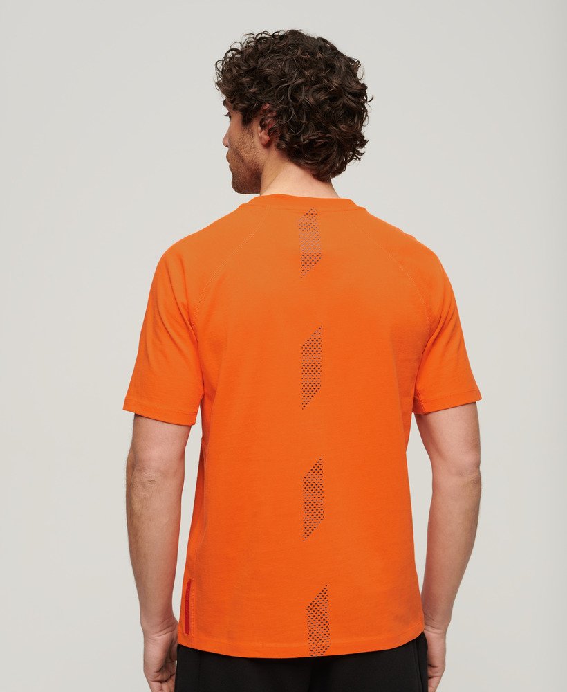 camiseta sport tech logo relaxed na cor laranja tigre