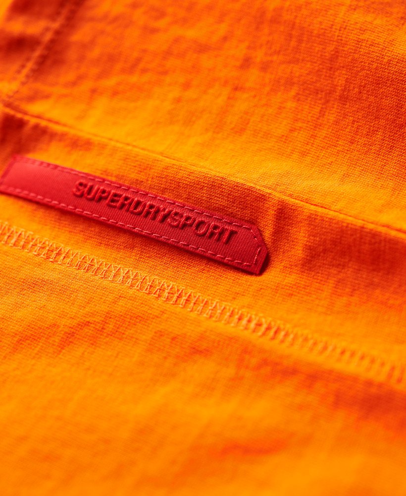 camiseta sport tech logo relaxed na cor laranja tigre