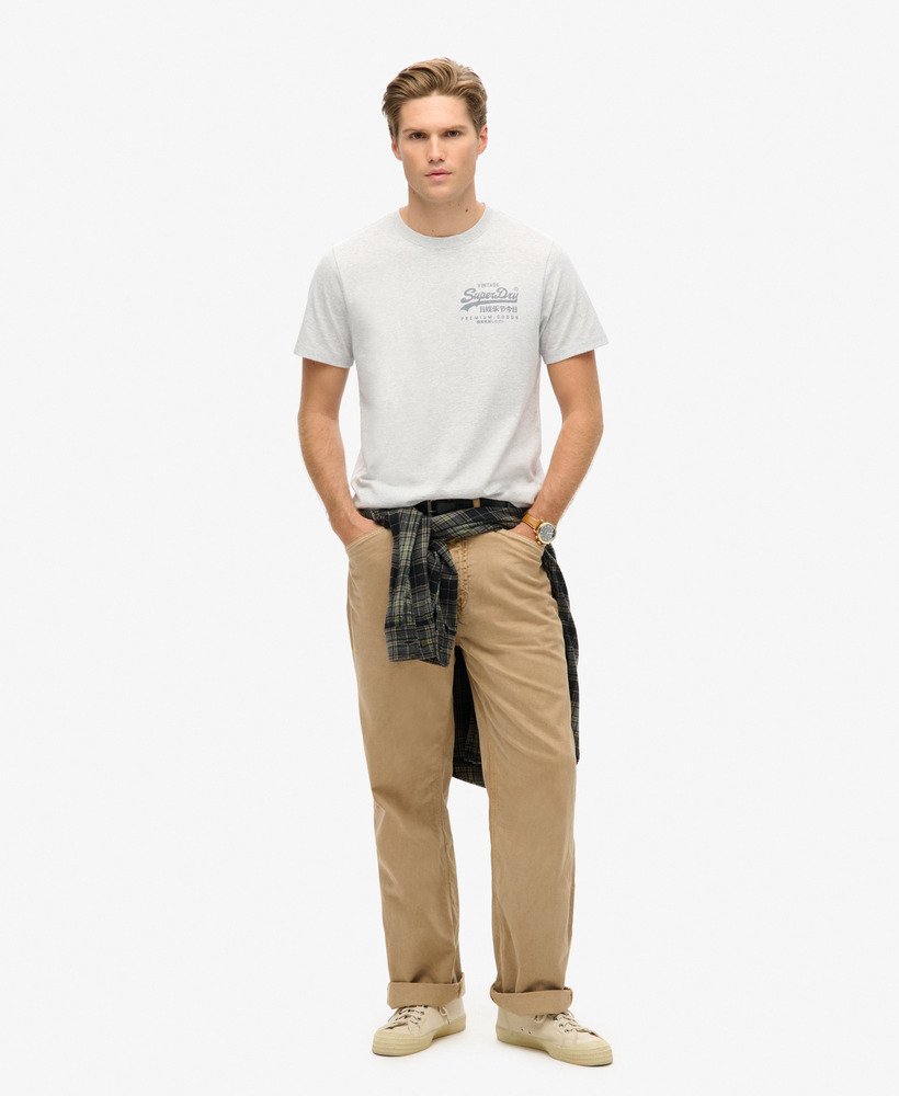 camiseta vintage logo heritage com estampa no peito em cinza mesclado
