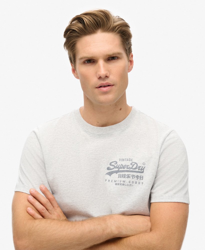 camiseta vintage logo heritage com estampa no peito em cinza mesclado