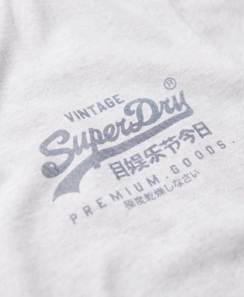 camiseta vintage logo heritage com estampa no peito em cinza mesclado
