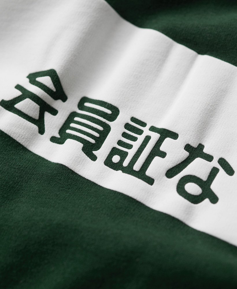 camiseta osaka 6 com estampa em relevo na cor verde esmalte.