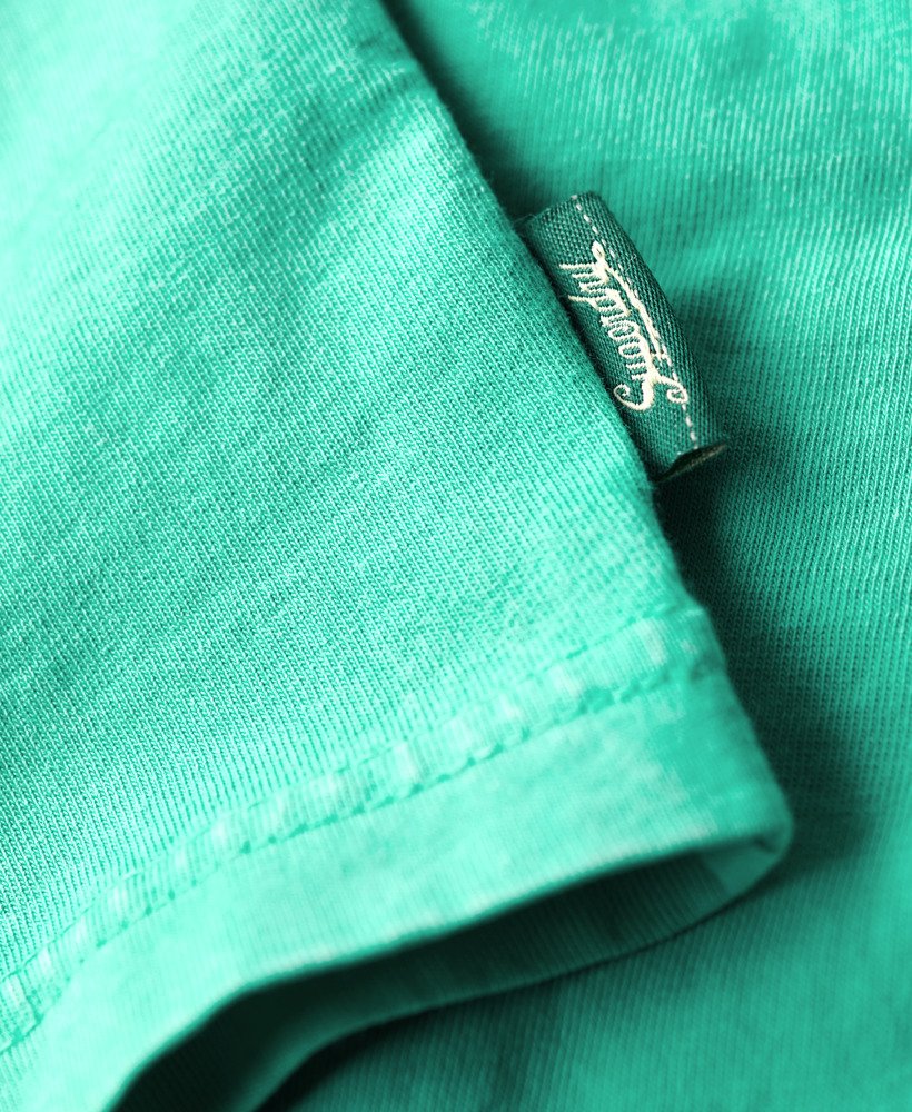 camiseta folgada neon travel chest na cor verde frio