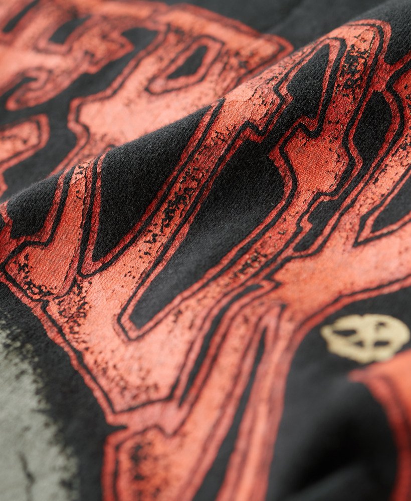 camiseta folgada com estampa de rock de motociclista na cor preta heavy metal.