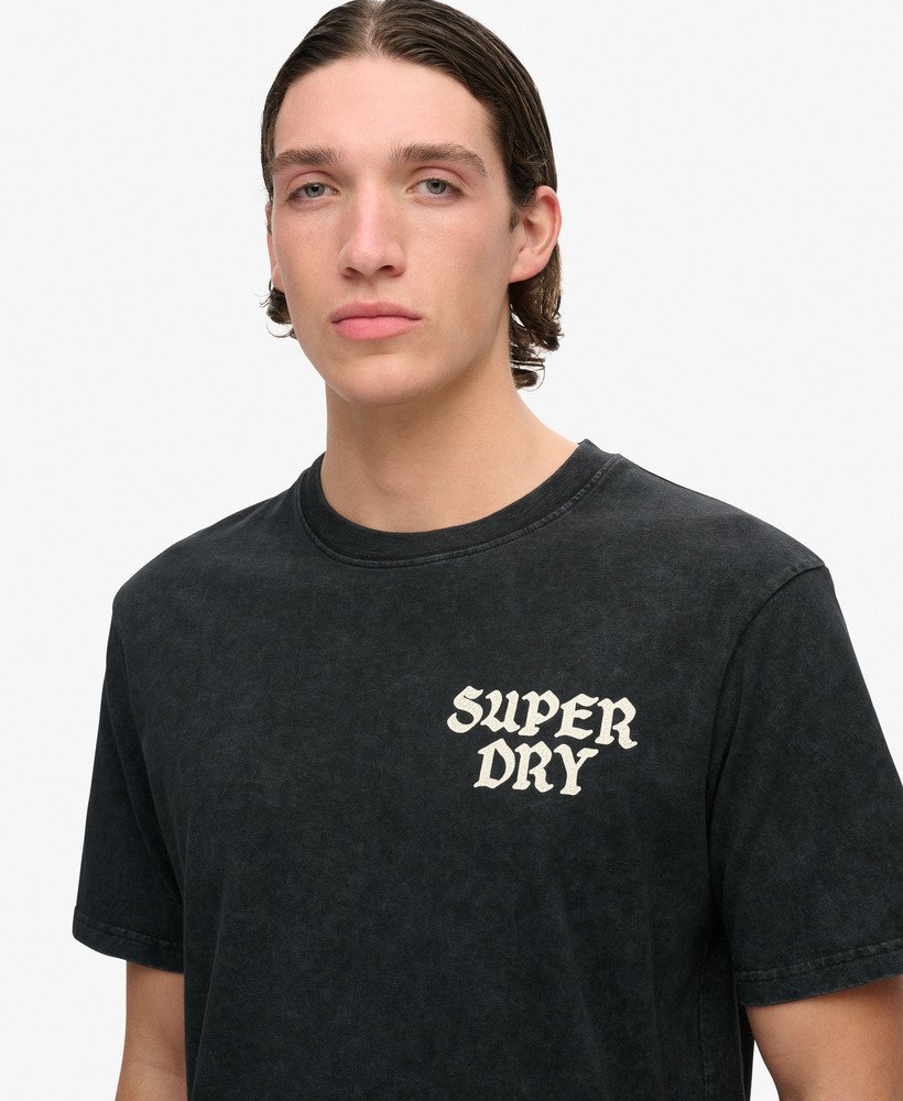 camiseta folgada para skate com estampa fotográfica em preto lavado.