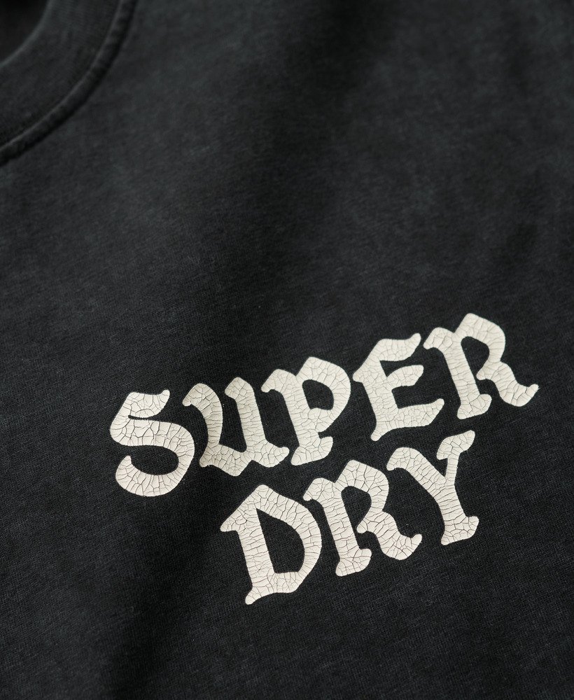 camiseta folgada para skate com estampa fotográfica em preto lavado.
