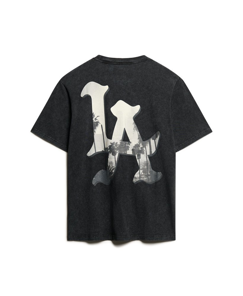 camiseta folgada para skate com estampa fotográfica em preto lavado.