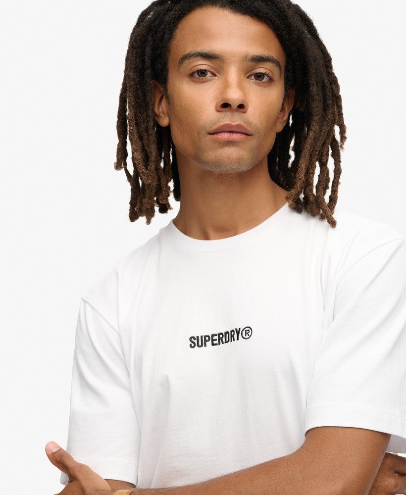 camiseta folgada com estampa de micro logo na cor branca brilhante.