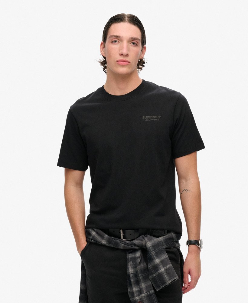 camiseta esportiva folgada de luxo na cor preta.