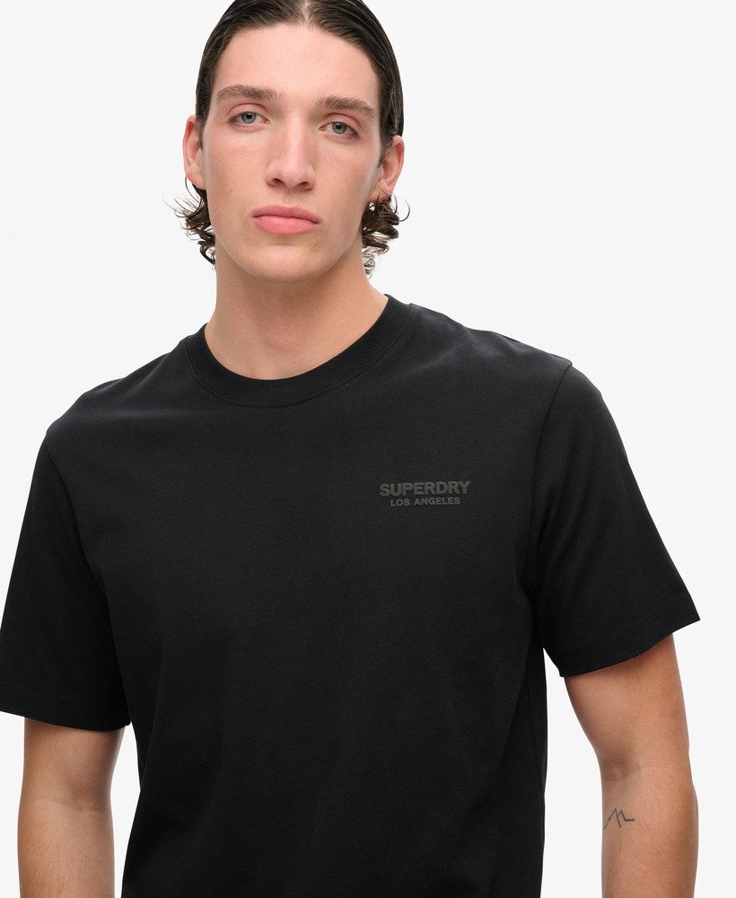 camiseta esportiva folgada de luxo na cor preta.