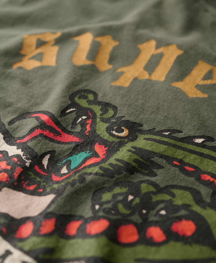 camiseta folgada com estampa de tatuagem nas costas em verde escuro