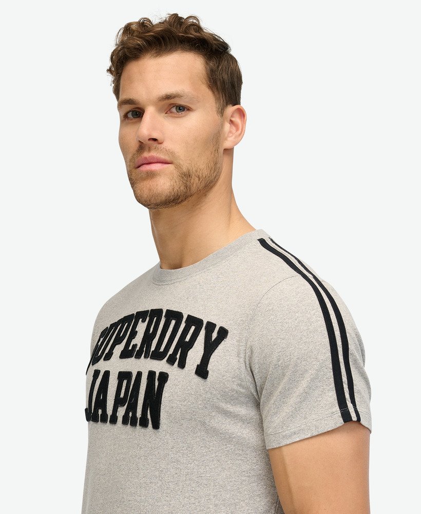 camiseta listrada vintage esportiva em moletom vintage cinza mescla claro