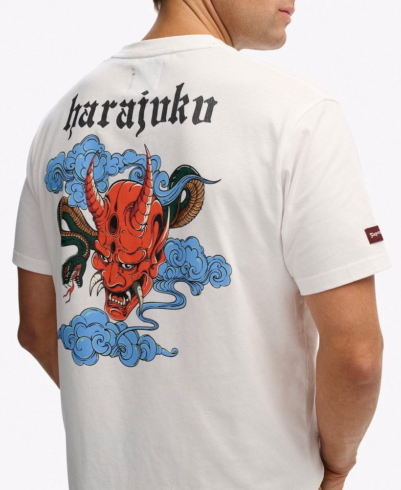 Camiseta folgada com estampa de tatuagem