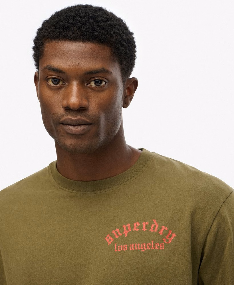 Camiseta folgada com estampa de tatuagem