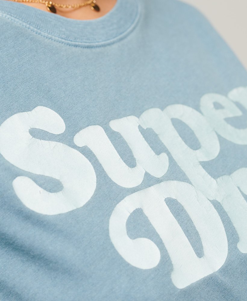 camiseta cooper classic com o logo dos anos 70 na cor azul heritage