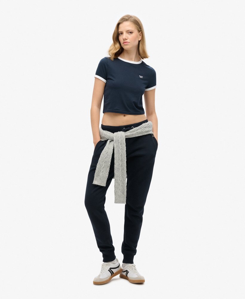 camiseta cropped de algodão orgânico com gola e punhos contrastantes na cor azul marinho eclipsebranco Óptico.