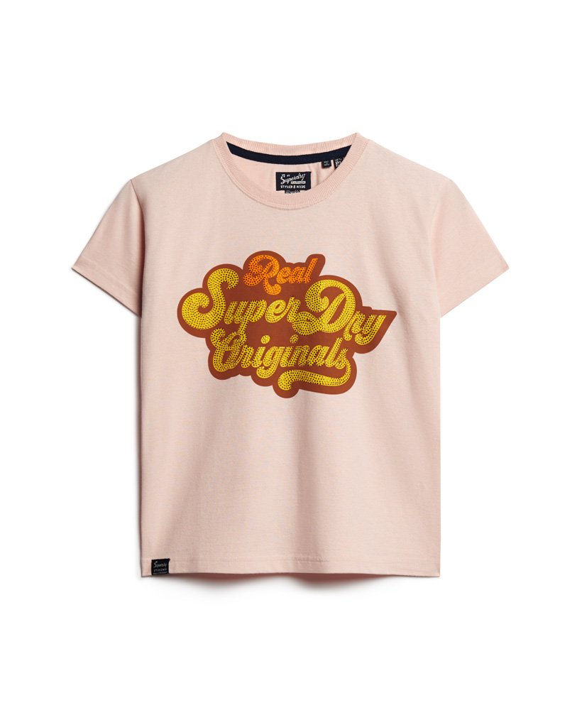 camiseta com logo metálico estilo anos 70 na cor rosa mesclado solomon.