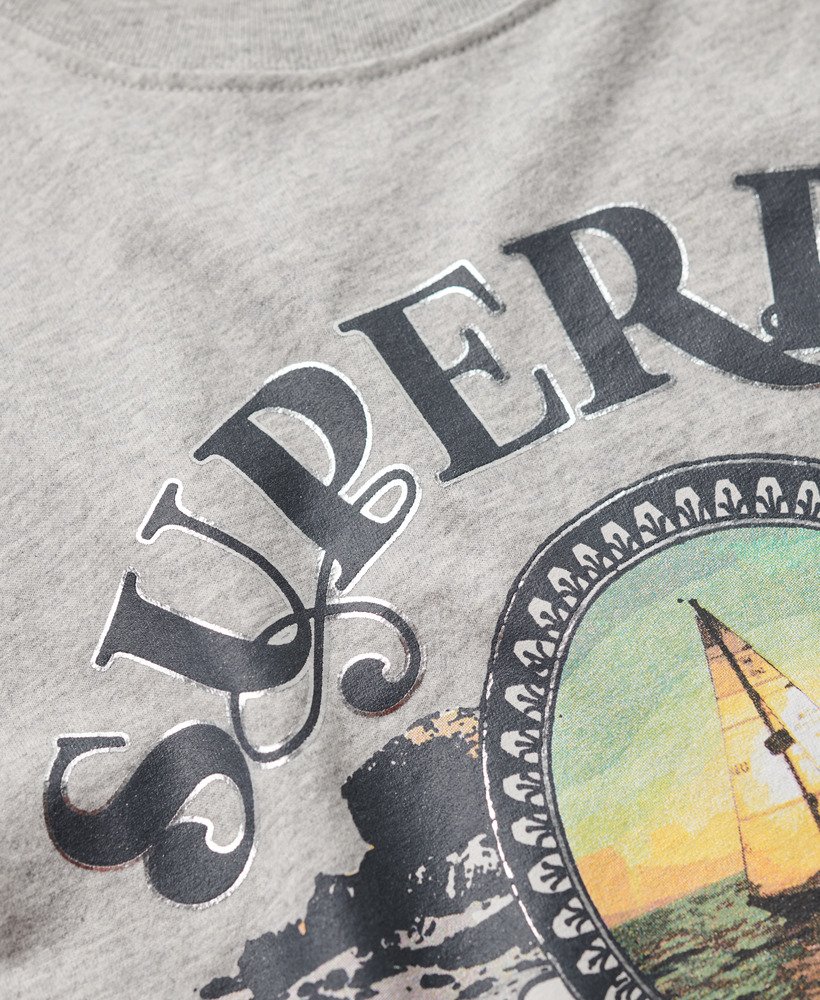 camiseta de viagem estilo lembrança modelagem relaxada na cor bege mesclado pedra-pomes.
