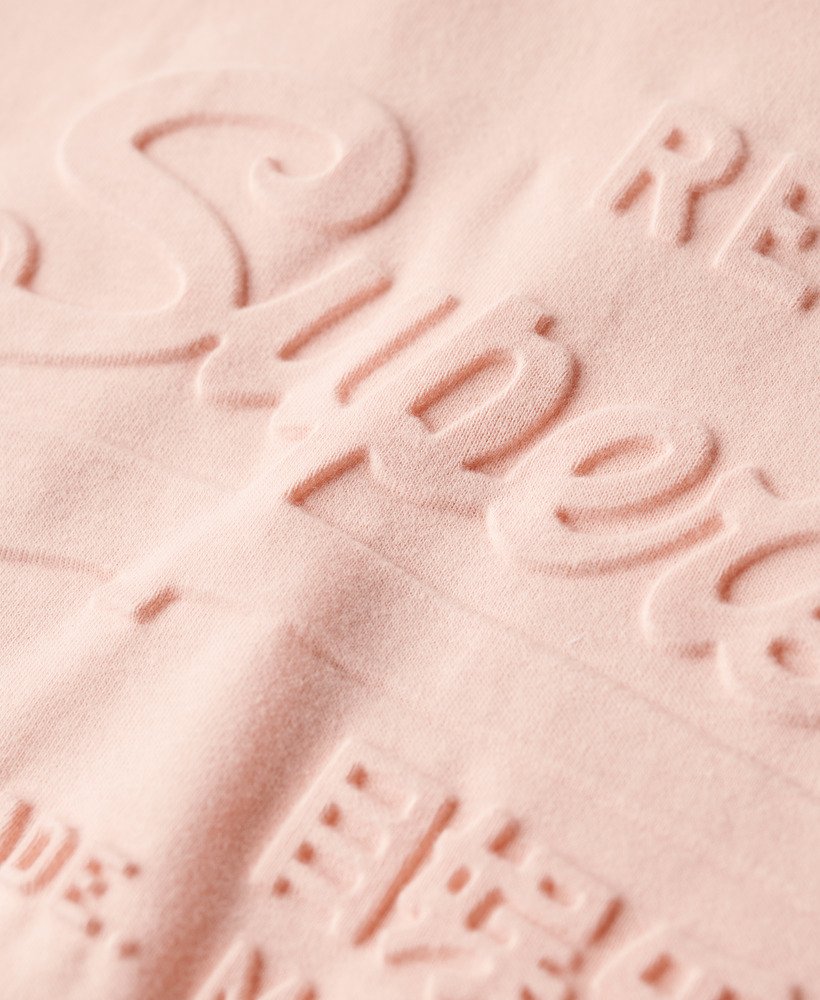 camiseta relaxed com relevo na cor rosa pêssego
