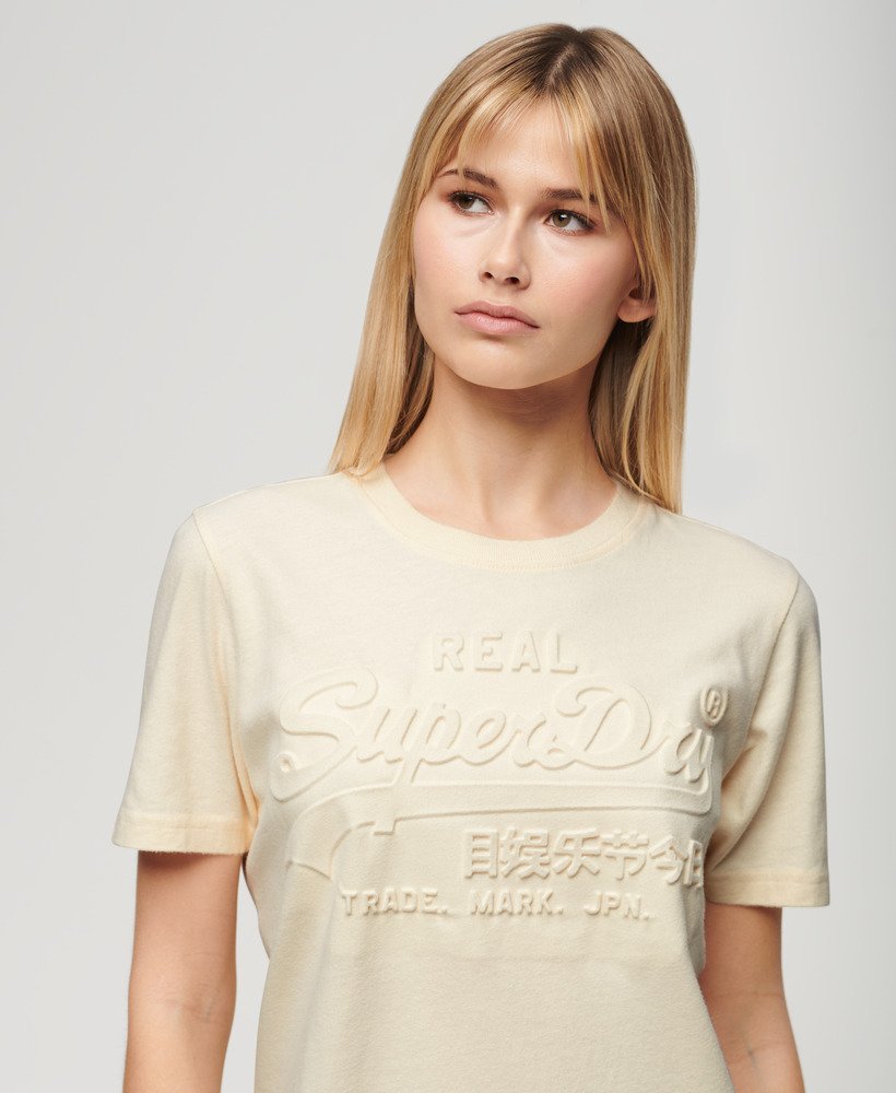 camiseta relaxed com estampa em relevo na cor branco arroz