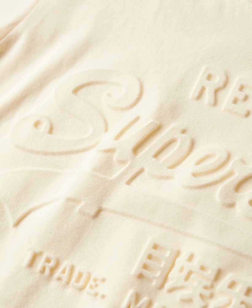 camiseta relaxed com estampa em relevo na cor branco arroz