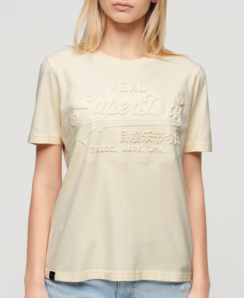 camiseta relaxed com estampa em relevo na cor branco arroz