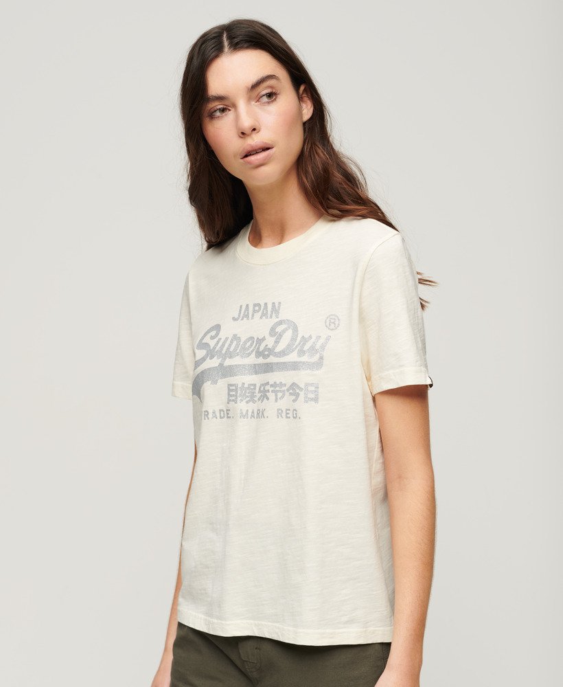 camiseta relaxed com logo metálico em moletom creme