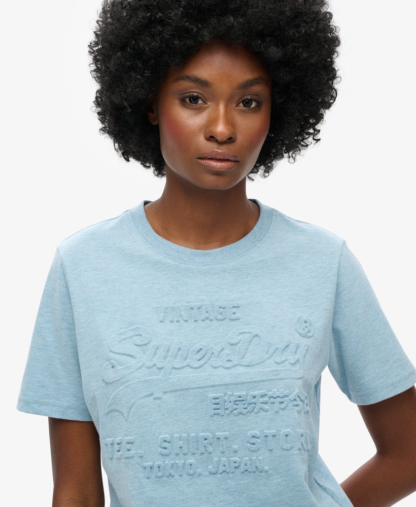 camiseta relaxed com logo vintage em relevo na cor azul mesclado