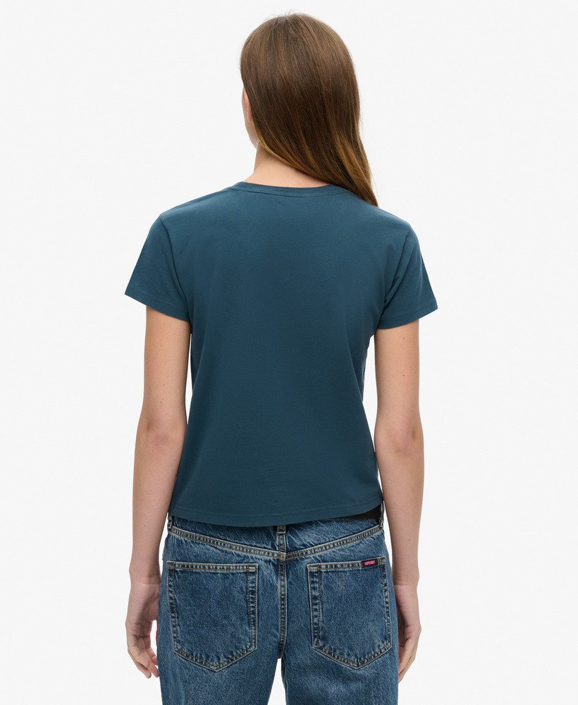 camiseta ajustada com strass e estampa de tatuagem na cor tinta.