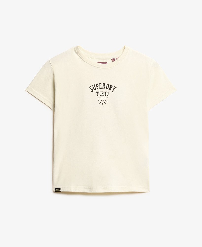 camiseta ajustada com strass e estampa de tatuagem na cor branca arroz.