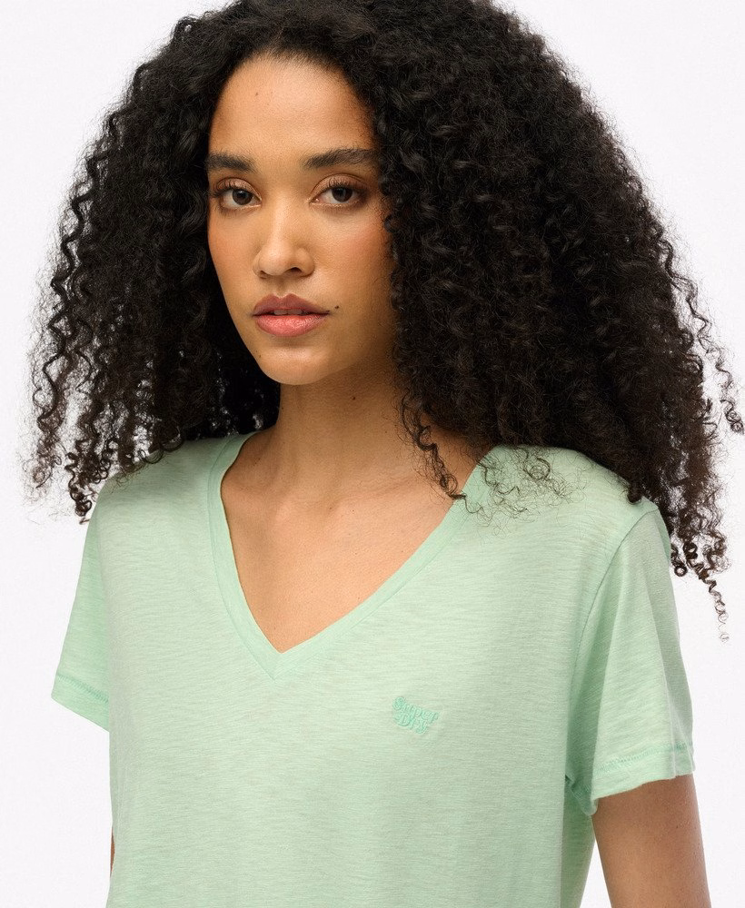 Camiseta com decote em V bordada em tecido texturizado