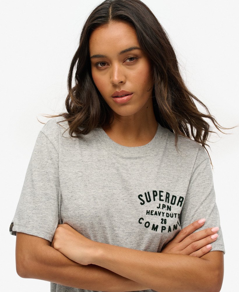 camiseta oversized para trabalho fabricada em tecido na cor cinza mesclado.