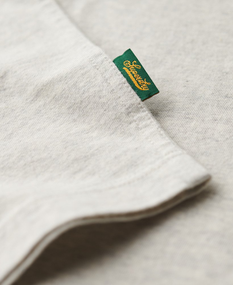 camiseta oversized essential logo retro listrada em cinza relâmpago grindle