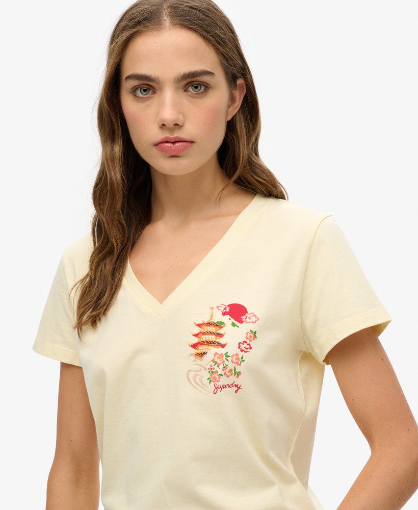 camiseta suika metallic relaxed com decote em v na cor creme urbano