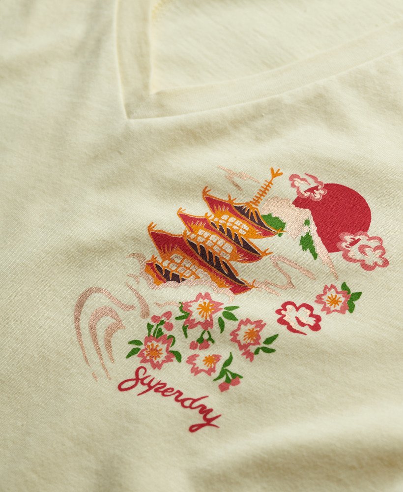 camiseta suika metallic relaxed com decote em v na cor creme urbano