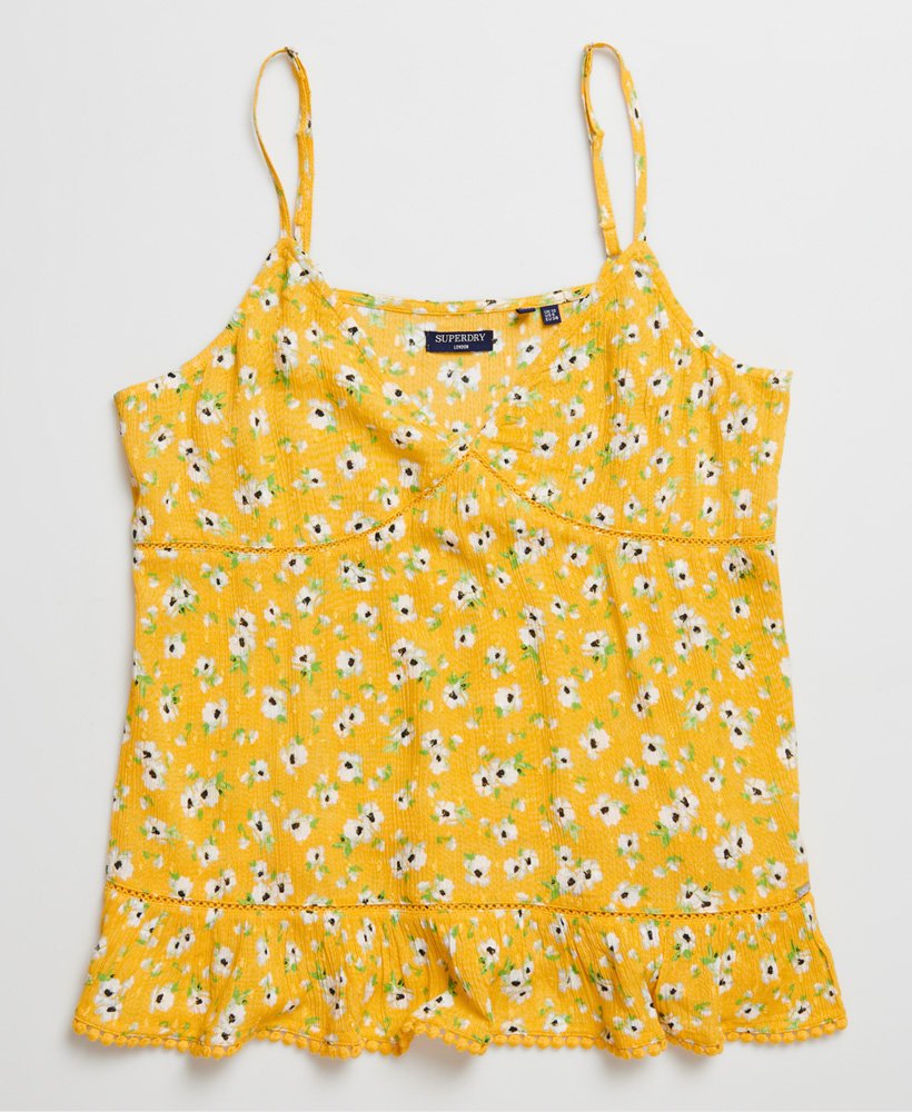 top de alcinha de renda para o verão com estampa floral amarela.