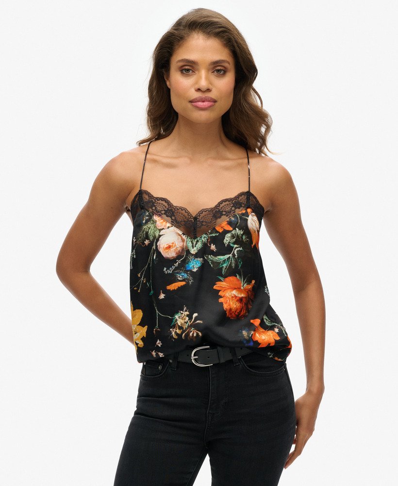 top de alças em cetim com detalhes em renda e estampa floral preta encantadora.