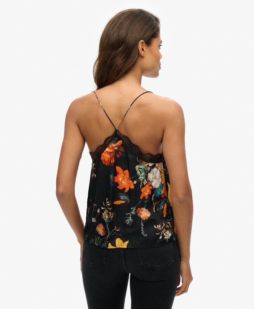 top de alças em cetim com detalhes em renda e estampa floral preta encantadora.