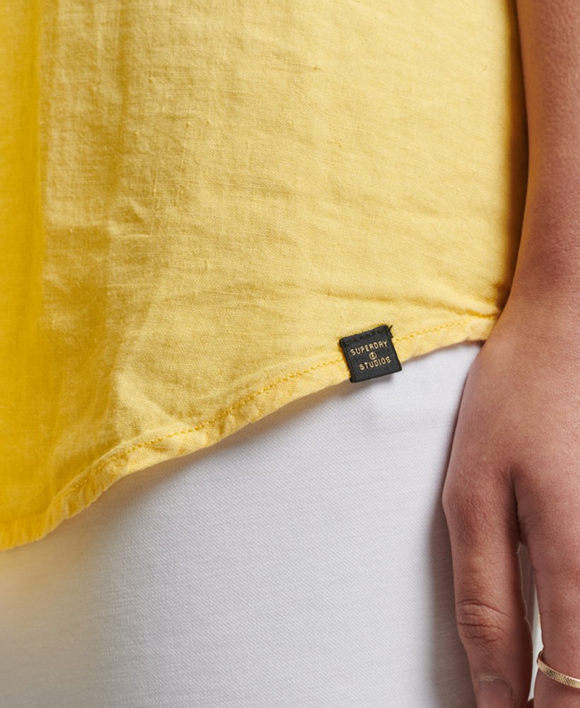 camisa boyfriend casual de linho na cor laranja mimosa.