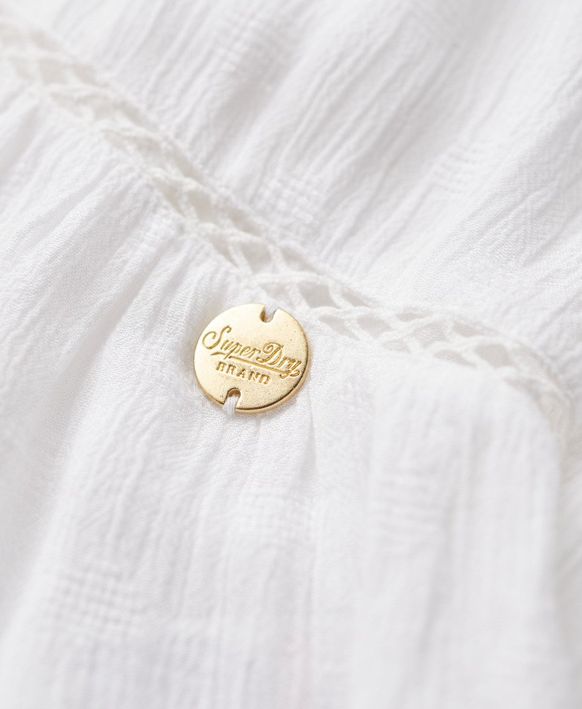 top de alças com detalhe em escada na cor off white