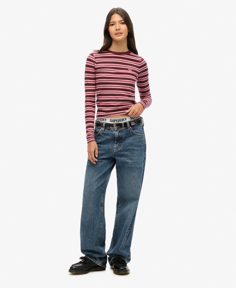 blusa listrada de manga comprida em tons de lilás e rosa.